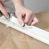 Kittiveitsi tasaisen kittikerroksen levittämiseen